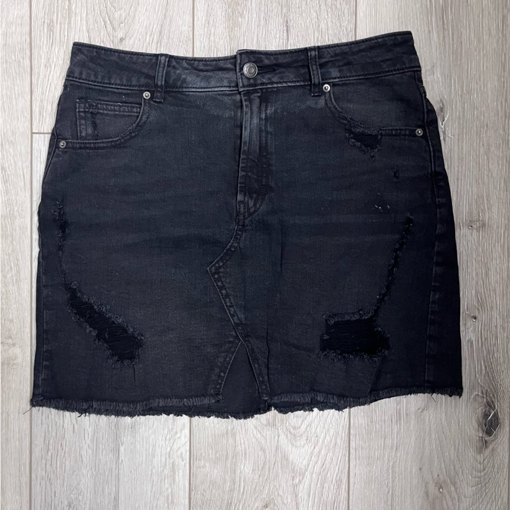 Black denim skirt, distressed